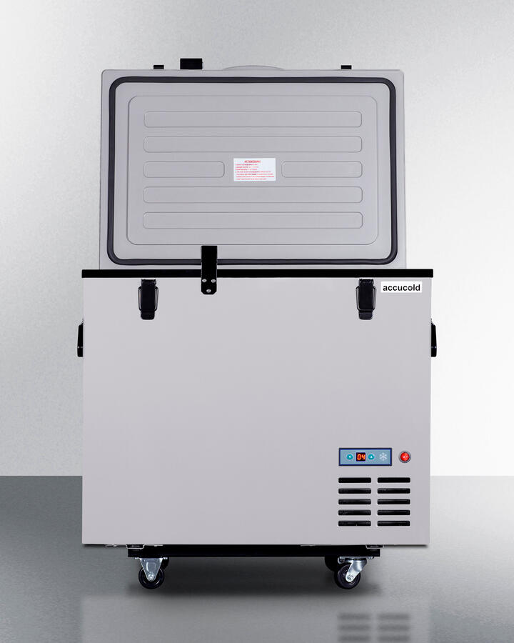 Summit SPRF86M2 Portable 12V/24V Cooler Capable Of Operation As Refrigerator (2-8(Degree)C) Or Freezer (-12(Degree)C), With Insulated Cover, Interior Wire Basket, Factory-Installed Lock, Strap Handle, And Four Pre-Installed Wheels